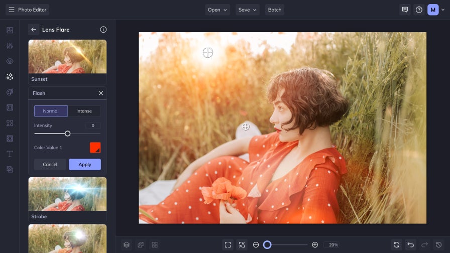 Editing a photo of a woman in red dress using BeFunky’s lens flare tool in UI view