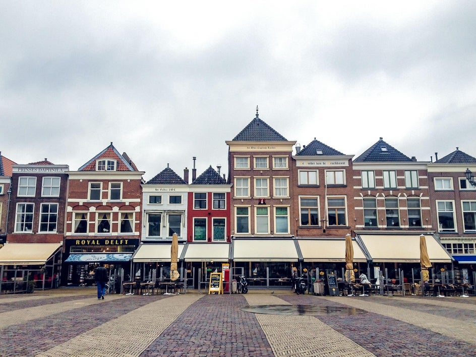 Cloudy street view of Amsterdam shops