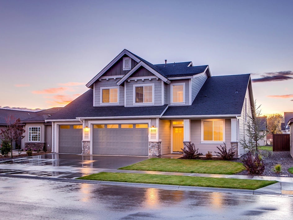 external house photo with purple dusk sky