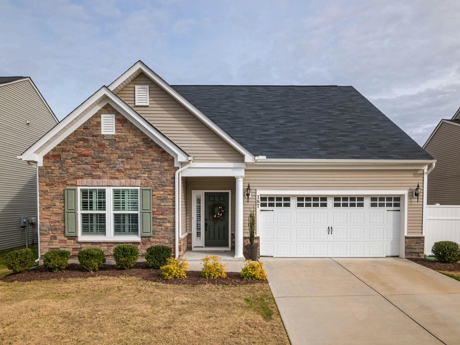 drab and muted sky in the background of a real estate exterior image