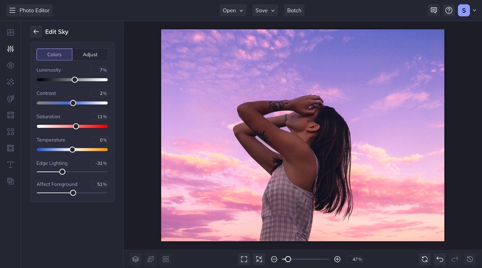 Sky replacer editor panel with exposure and contrast settings for refining portrait sky and light
