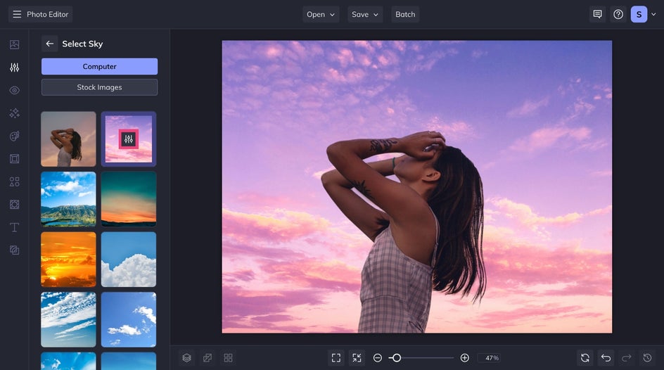 Warm-toned sky applied using sky replacer to enhance a portrait scene with pastel clouds and settings icon highlighted
