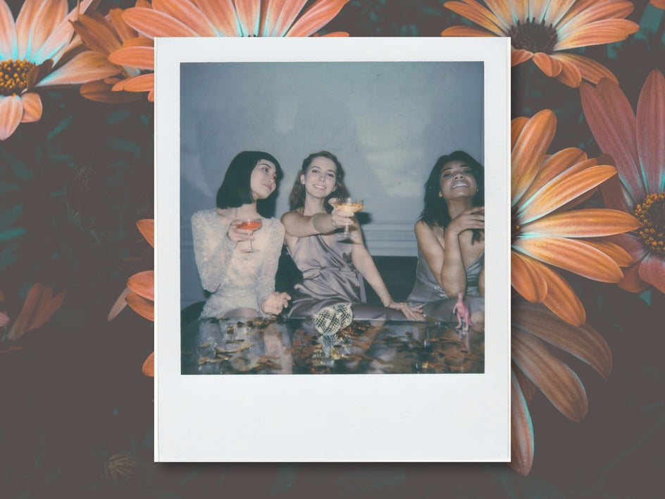 Deblur AI tool applied to group polaroid photo for clarity and crisp facial features