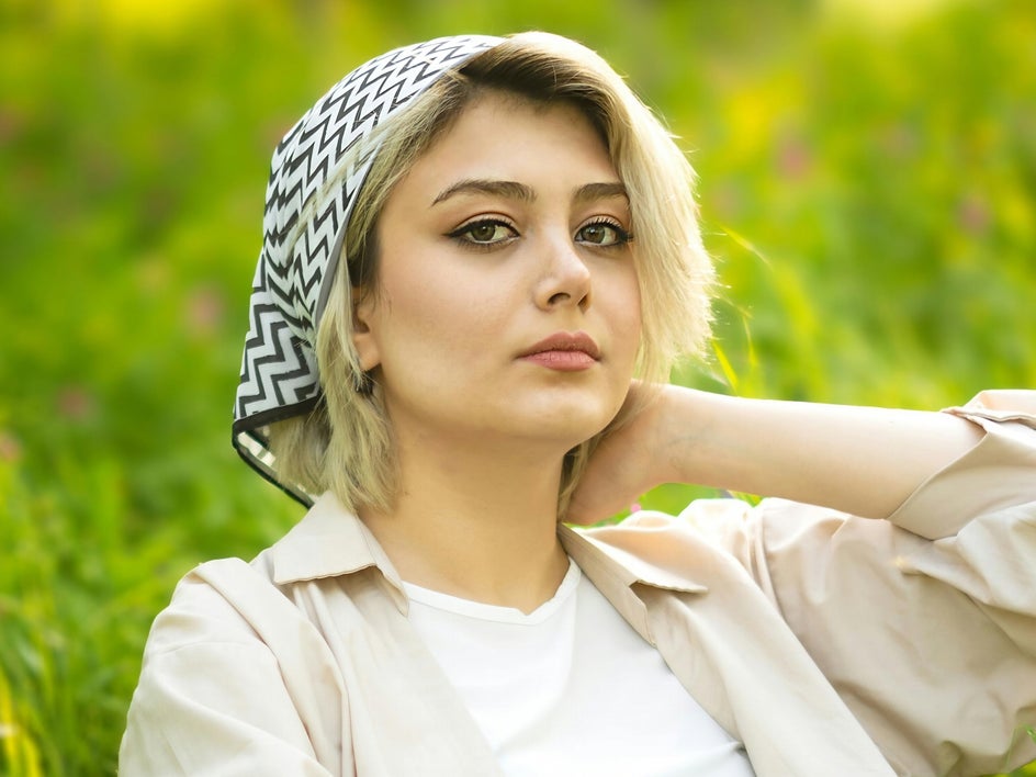 Close up female portrait in field